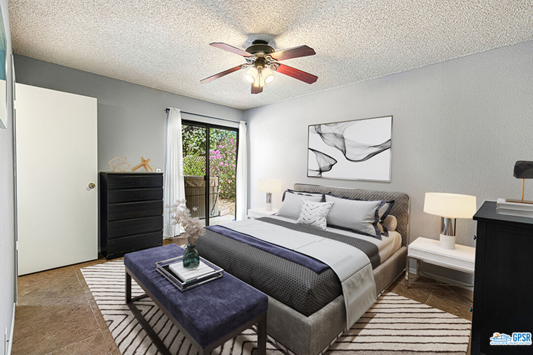 2783 North Cerritos Road Palm Springs, CA 92262 - Photo 19 of 25 a bedroom with a bed furniture and a window
