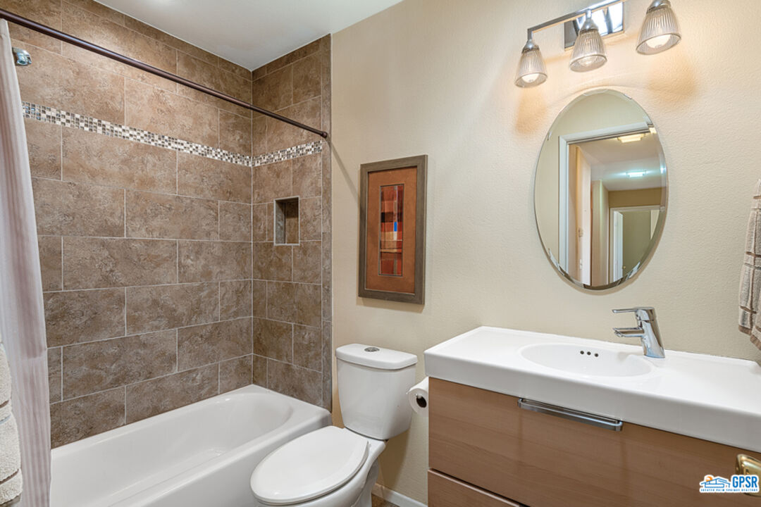 2783 North Cerritos Road Palm Springs, CA 92262 - Photo 23 of 25 a bathroom with a sink toilet and shower