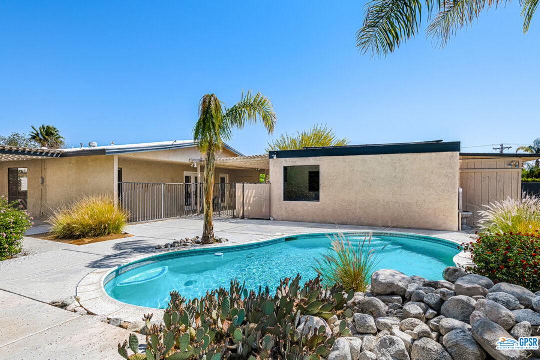 2783 North Cerritos Road Palm Springs, CA 92262 - Photo 3 of 25 a swimming pool with yard outdoor seating and yard in back