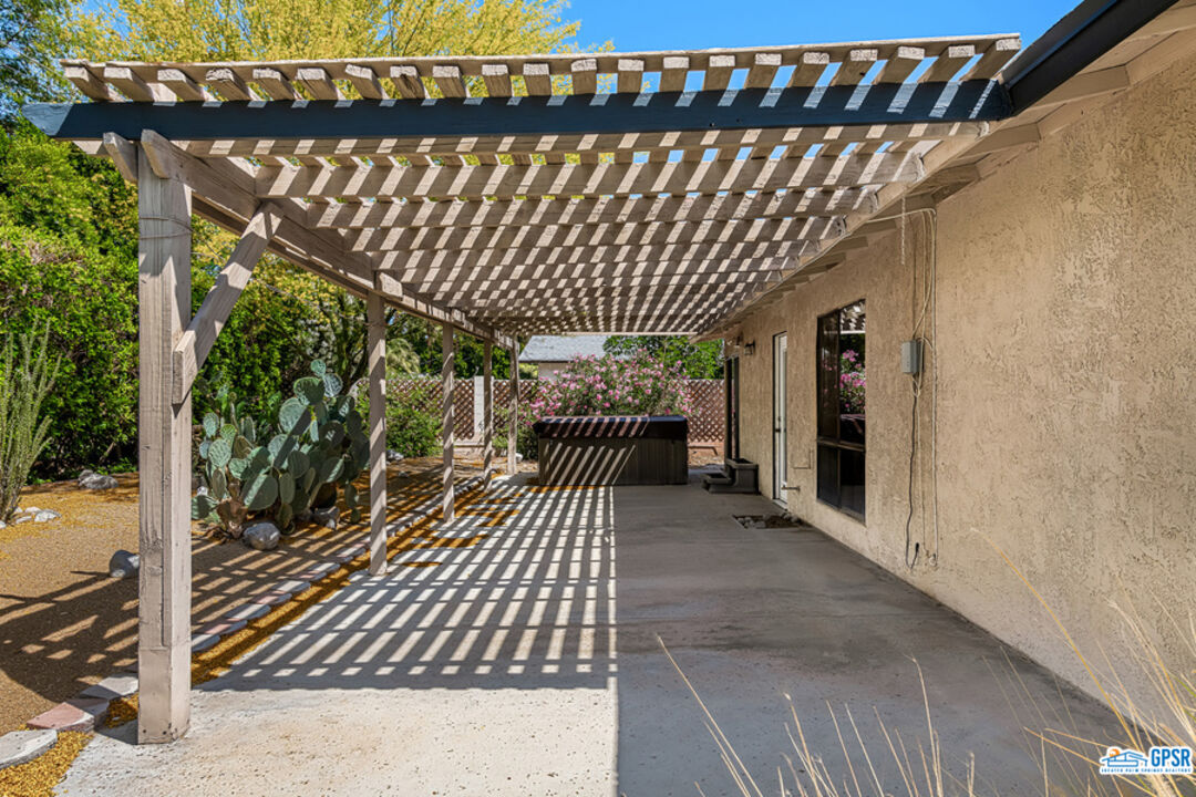 2783 North Cerritos Road Palm Springs, CA 92262 - Photo 8 of 25 a view of a porch with wooden floor