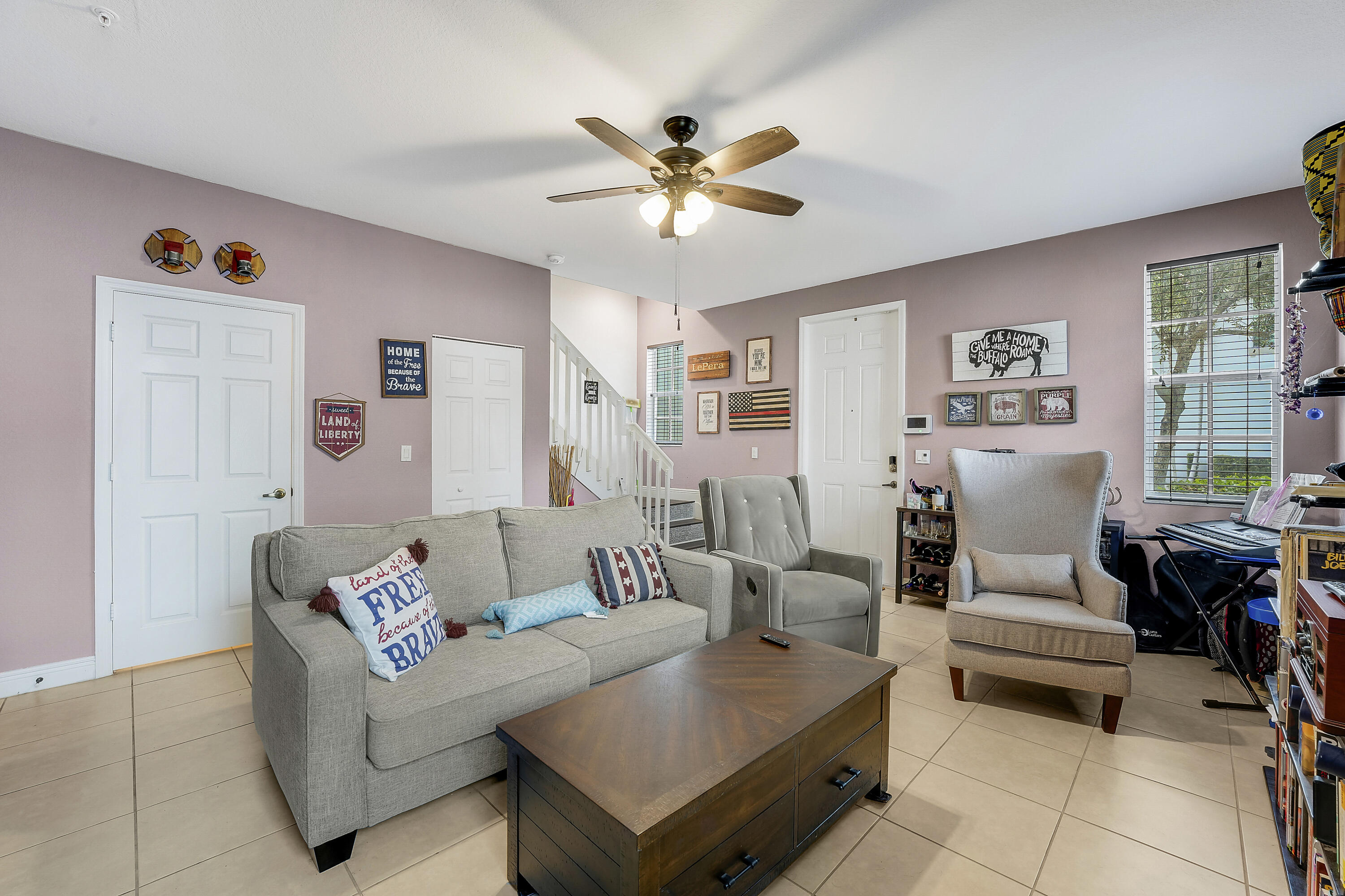 2900 Southwest 119th Way Miramar, FL 33025 - Photo 18 of 37 a living room with furniture and a window