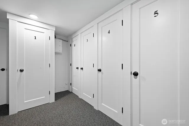 a view of a hallway with closet area