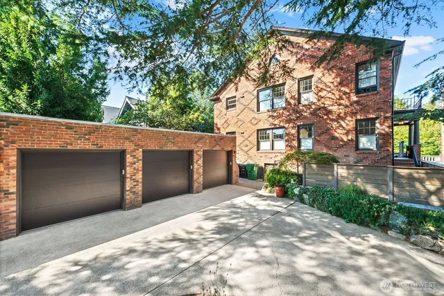 a view of a street with a building in the background