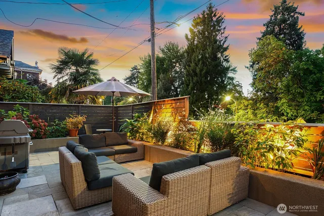 a outdoor living space with furniture and city view