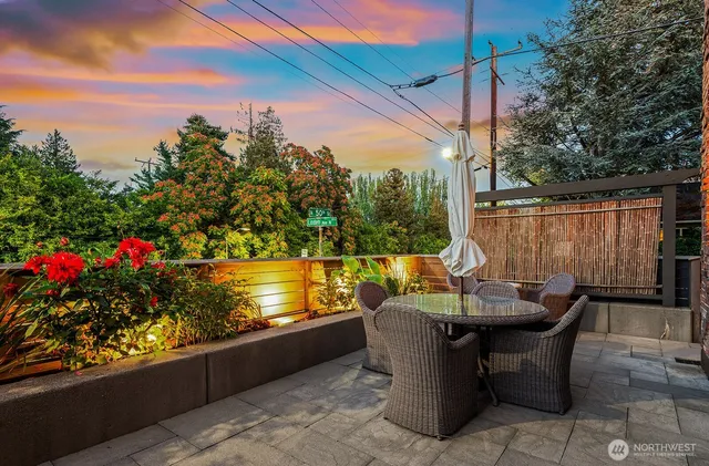 a view of a chairs and table in the patio