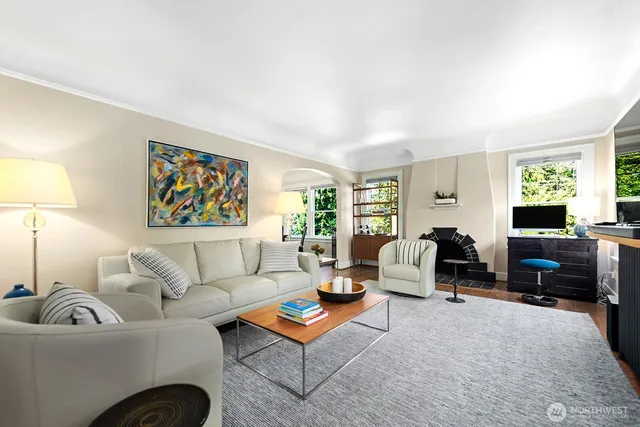 a living room with furniture and a couch