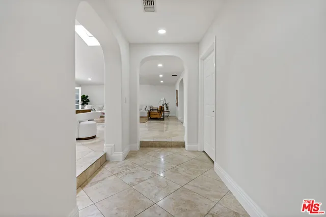 a utility room with sink dryer and washer