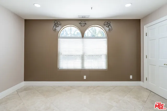 a view of swimming pool with a yard