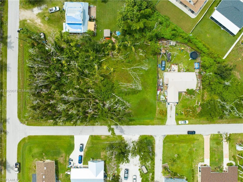 5409 Phillips Street Bokeelia, FL 33922 - Photo 4 of 7 a view of a yard