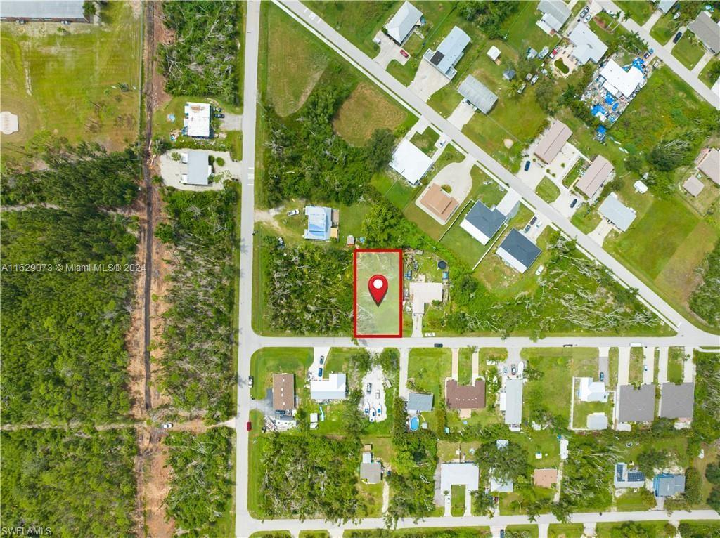 5409 Phillips Street Bokeelia, FL 33922 - Photo 5 of 7 a picture of street view