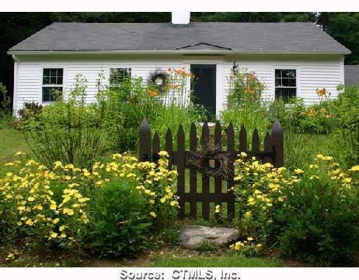 32 Robertsville Road Barkhamsted, CT 06065 - Photo 1 of 1 a front view of a house with a yard