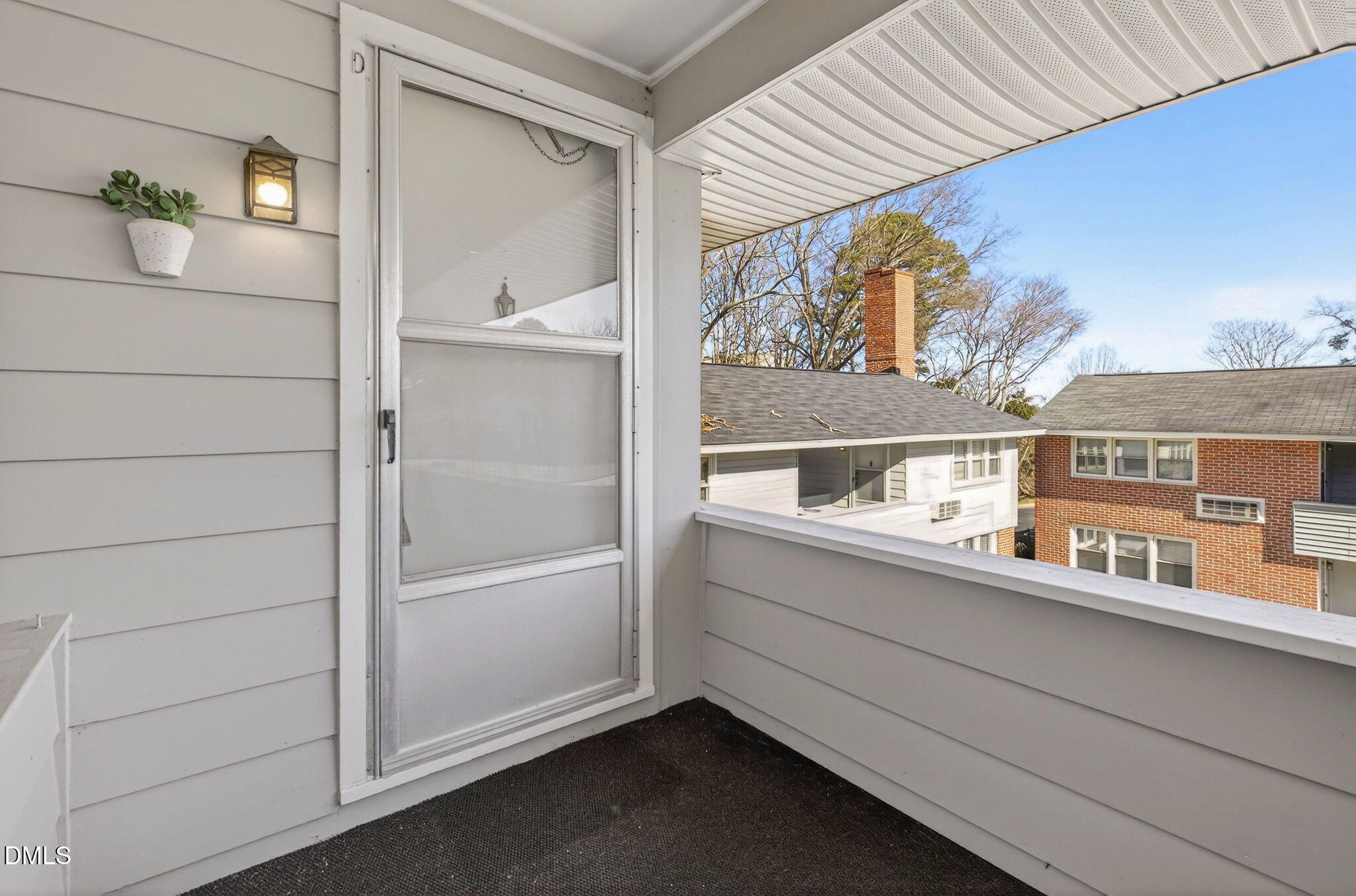 827 Daniels Street, Unit D Raleigh, NC 27605 - Photo 3 of 15 a house view with a outdoor space
