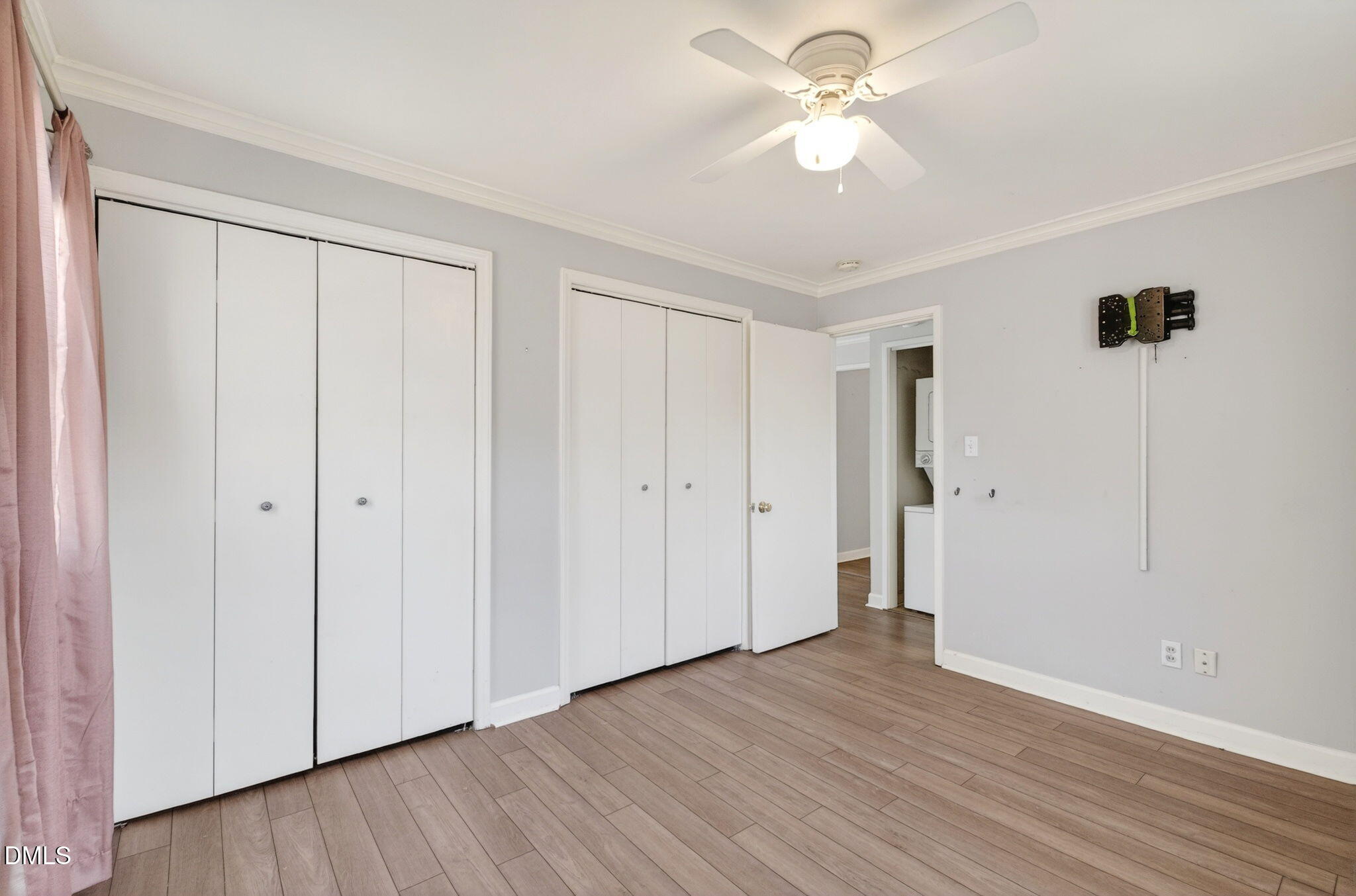 827 Daniels Street, Unit D Raleigh, NC 27605 - Photo 8 of 15 a view of empty room with wooden floor