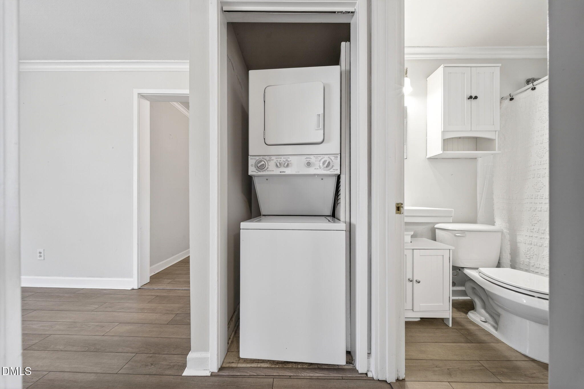 827 Daniels Street, Unit D Raleigh, NC 27605 - Photo 10 of 15 a bathroom with a toilet and a vanity