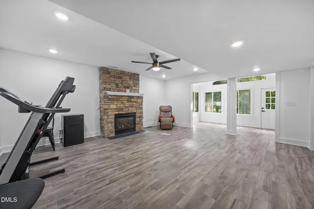 a view of a livingroom with a furniture and a flat screen tv
