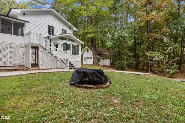 a house view with a garden space