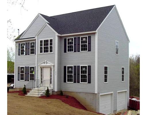 592 Southbridge Road Warren, MA 01083 - Photo 2 of 4 a front view of a house with a yard