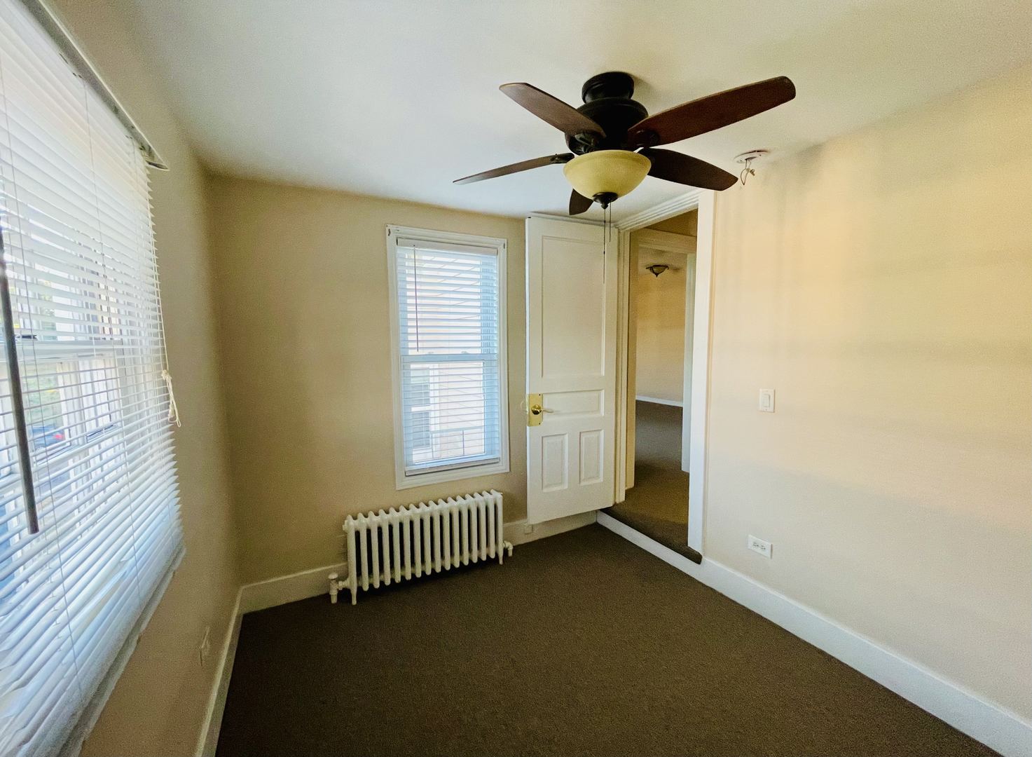 72 North 4th Street, Unit 4 Aurora, IL 60505 - Photo 10 of 11 a view of an empty room and window