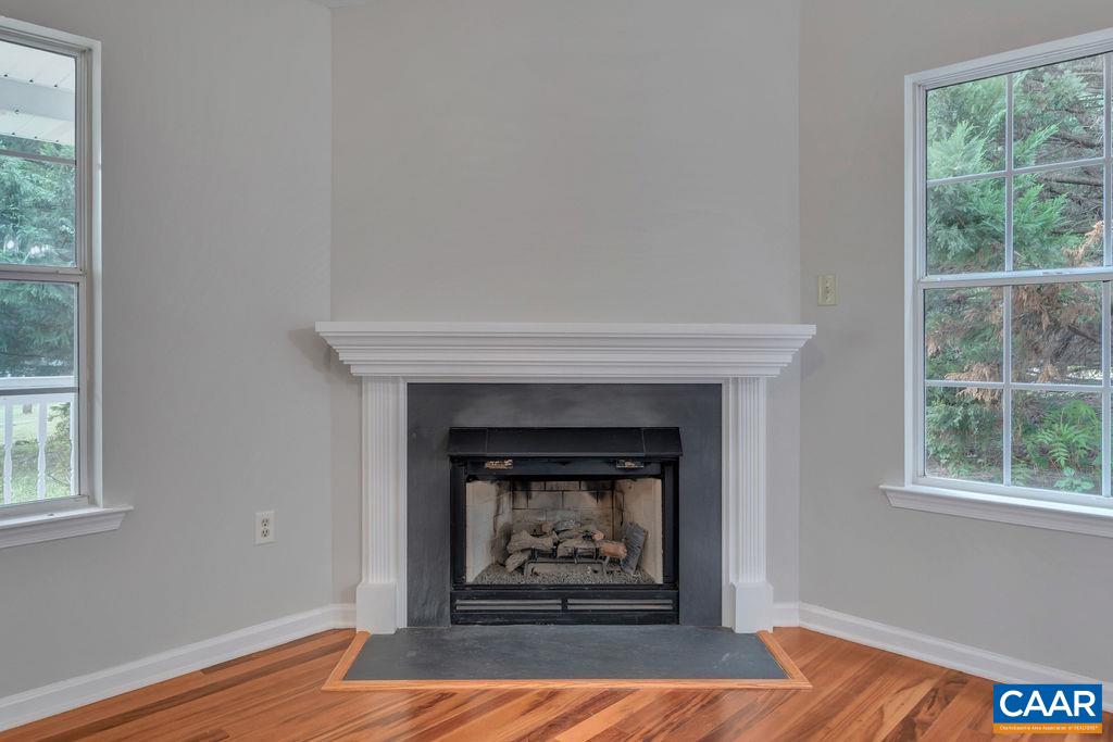 6807 Spring Hill Road Ruckersville, VA 22968 - Photo 16 of 37 a living room with a fireplace