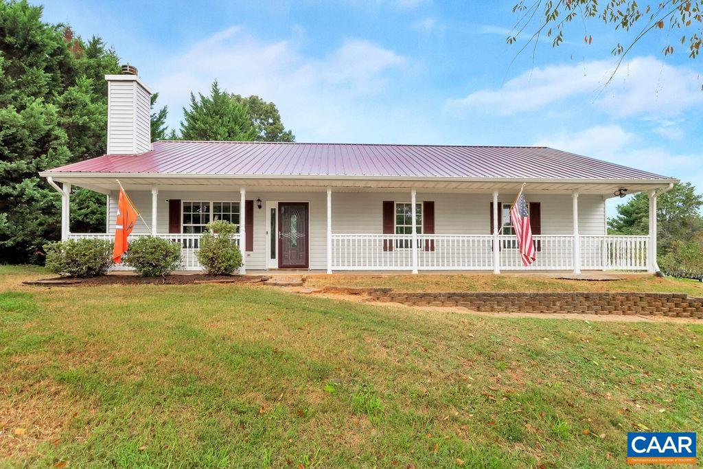 6807 Spring Hill Road Ruckersville, VA 22968 - Photo 2 of 37 a view of a house with a swimming pool and a yard