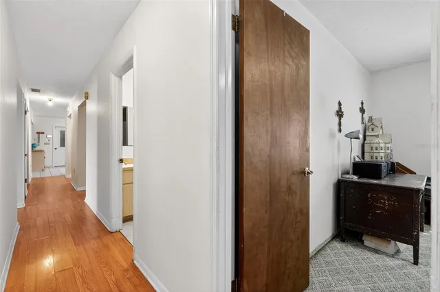a view of a hallway view with living room
