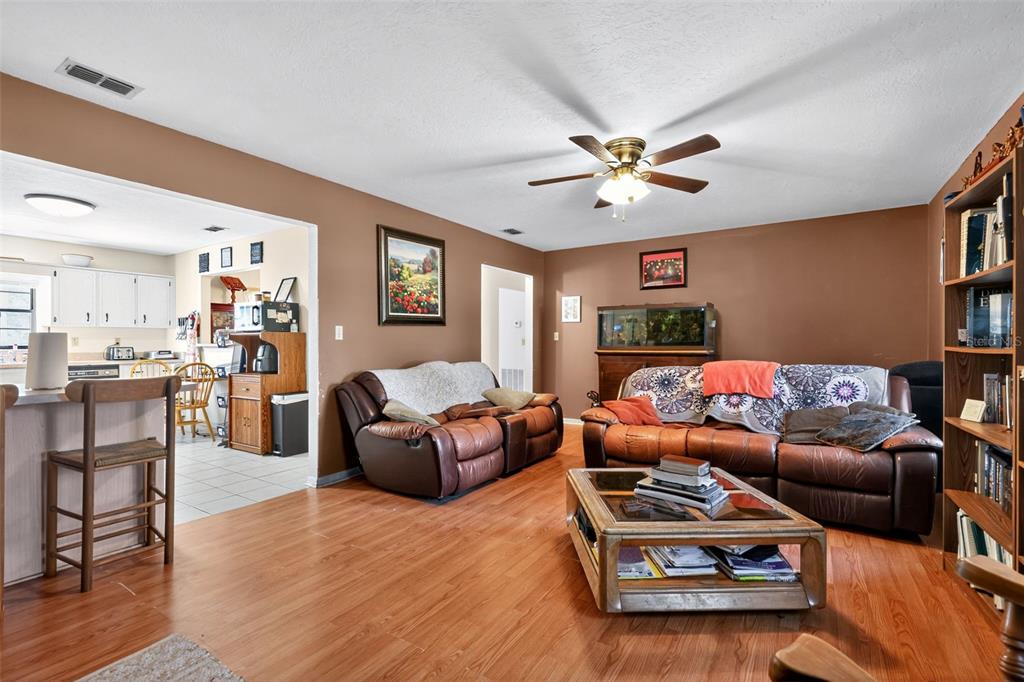 1925 Northwest 60th Avenue Ocala, FL 34482 - Photo 21 of 29 a living room with furniture and a large window