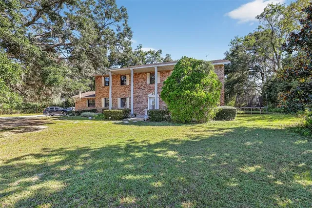 a view of a house with a swimming pool