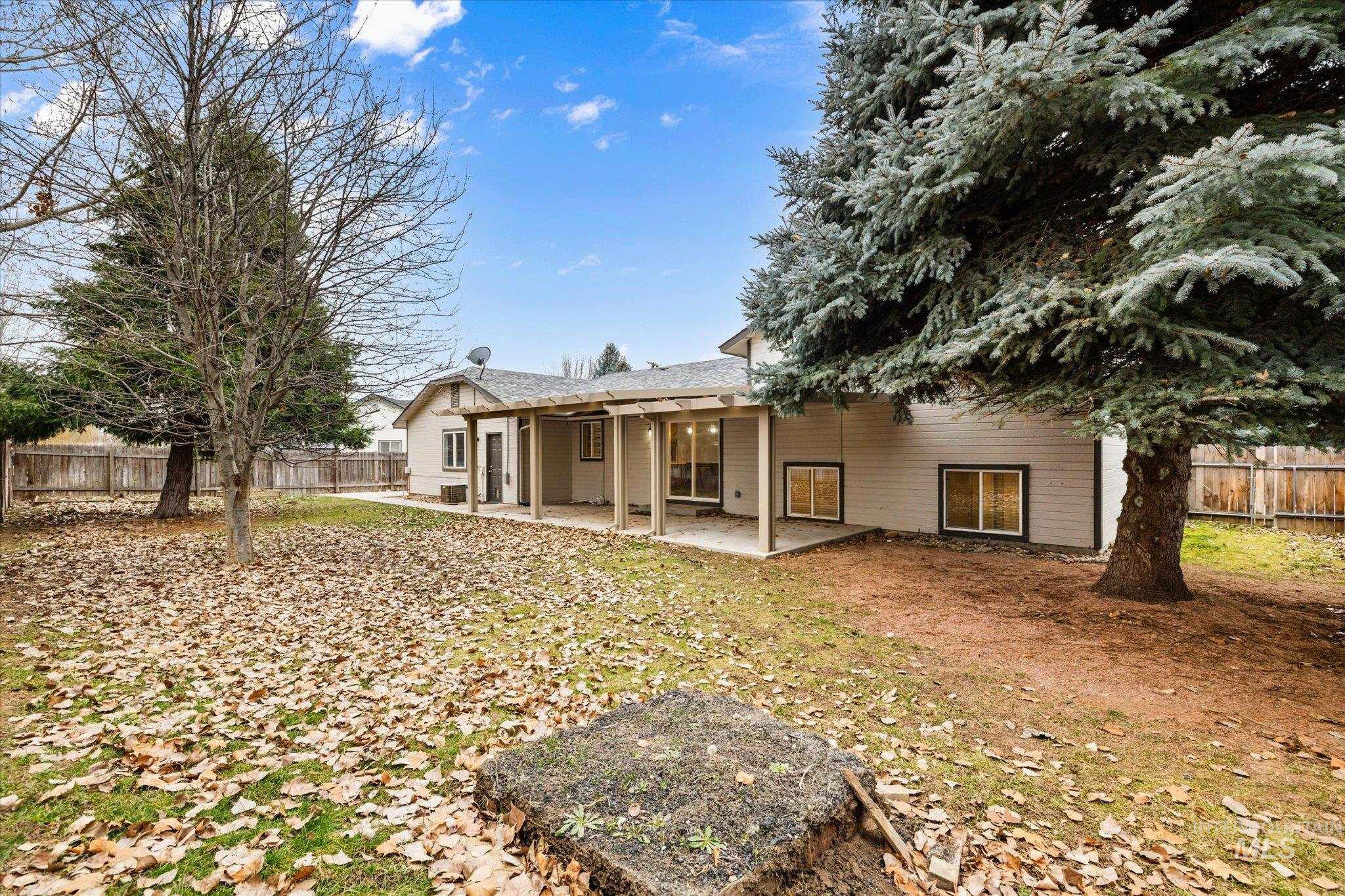 2870 North Morello Avenue Meridian, ID 83646 - Photo 16 of 20 Back of house with a fenced backyard and a patio area