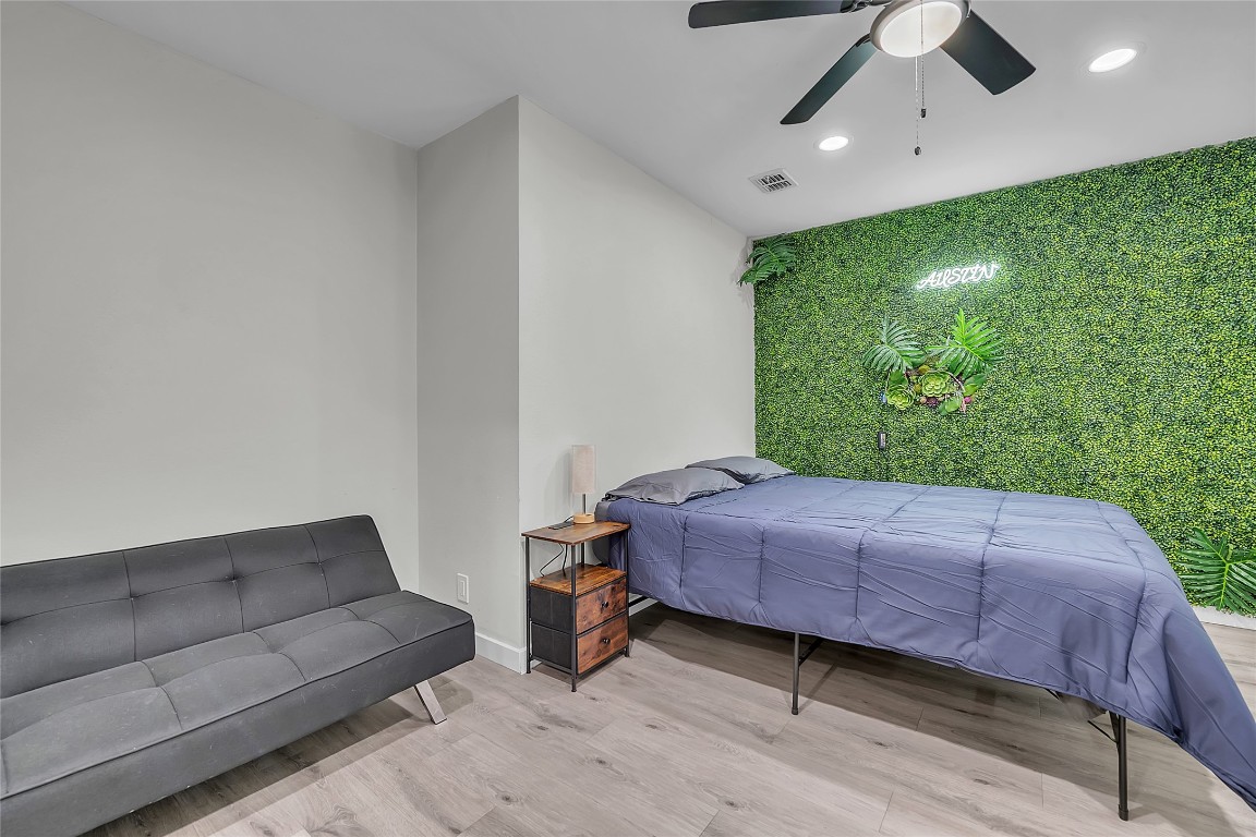 3400 Laguna Drive Austin, TX 78741 - Photo 15 of 24 a bed room with a bed and a television