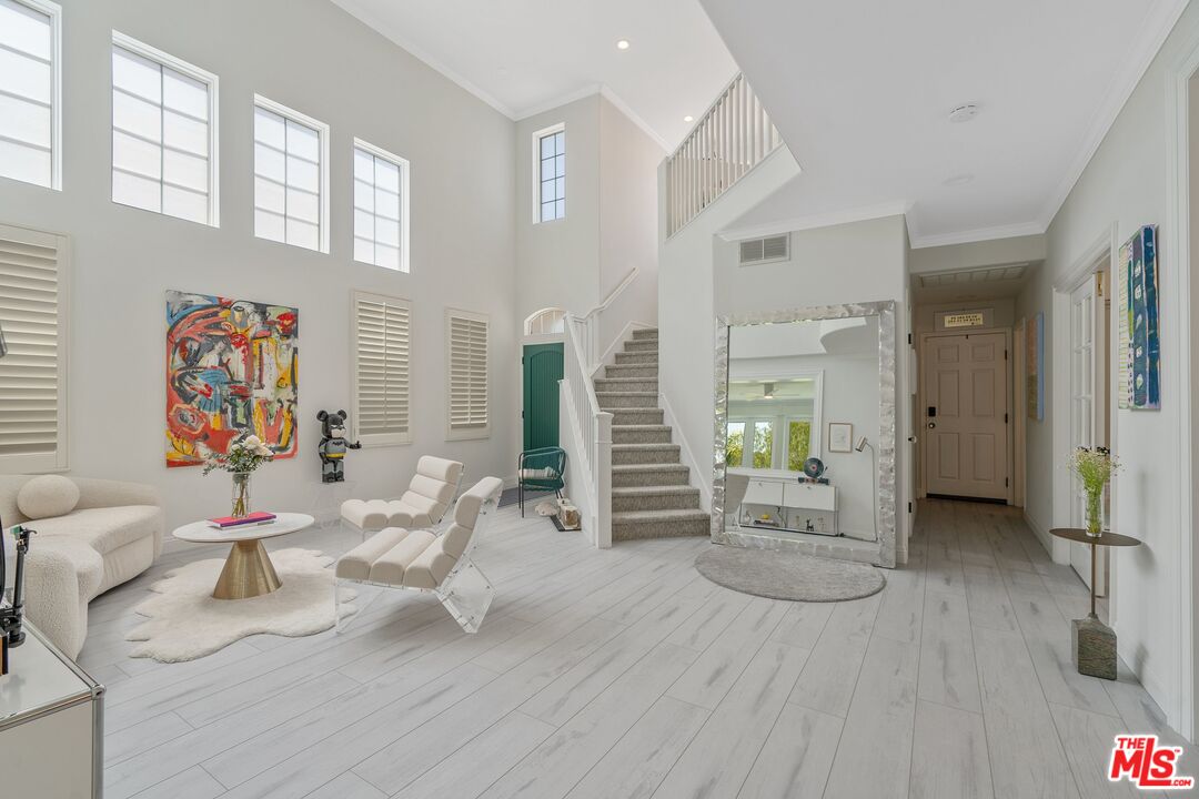 25614 Lewis Way Stevenson Ranch, CA 91381 - Photo 4 of 55 a living room with furniture and wooden floor