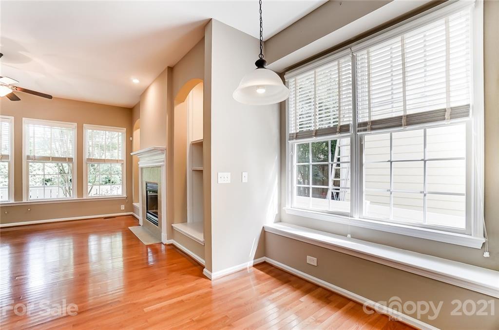 142 Blandina Court Fort Mill, SC 29708 - Photo 11 of 40 a view of an empty room with wooden floor and a window