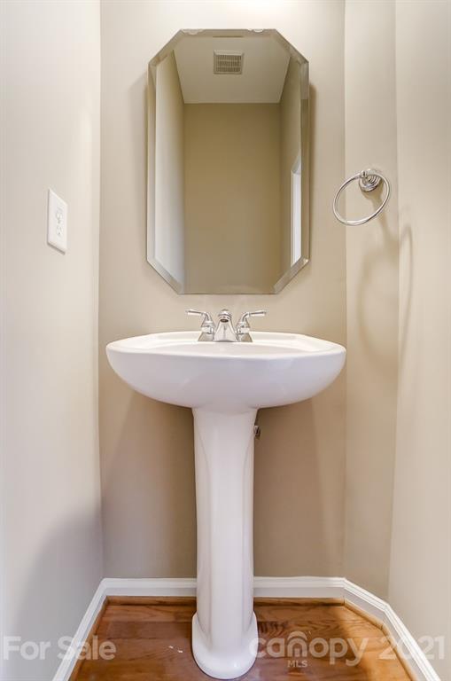 142 Blandina Court Fort Mill, SC 29708 - Photo 15 of 40 a bathroom with a sink and a mirror