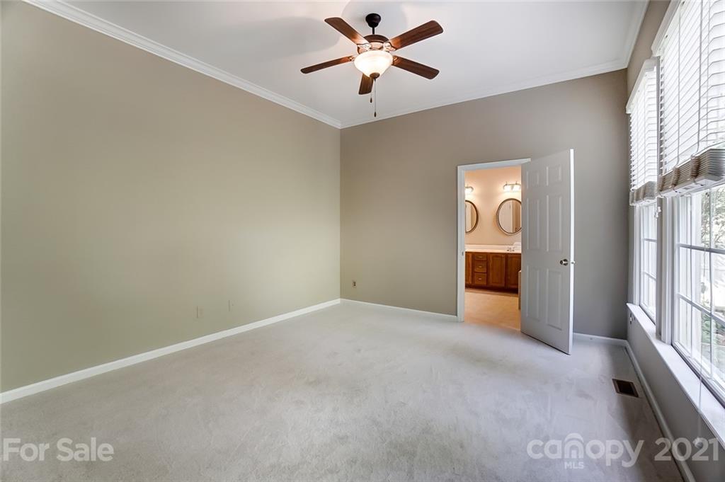 142 Blandina Court Fort Mill, SC 29708 - Photo 18 of 40 a view of a livingroom with a ceiling fan and window