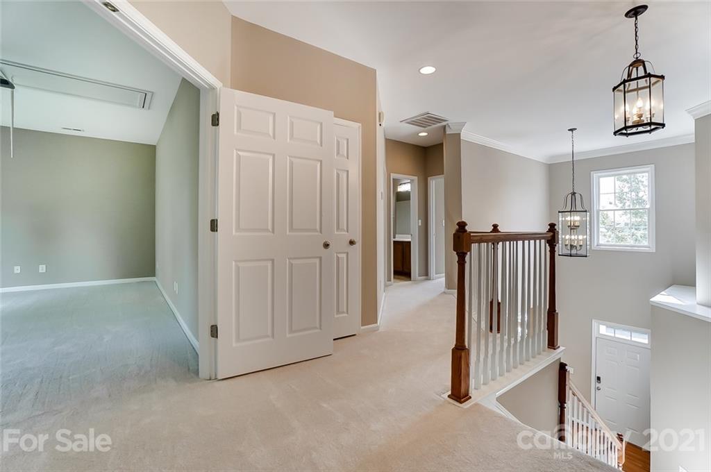 142 Blandina Court Fort Mill, SC 29708 - Photo 26 of 40 a view of a hallway with entryway door door and stairs