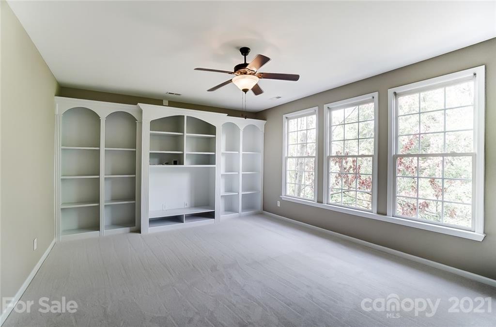 142 Blandina Court Fort Mill, SC 29708 - Photo 27 of 40 a view of an empty room with a window and kitchen view