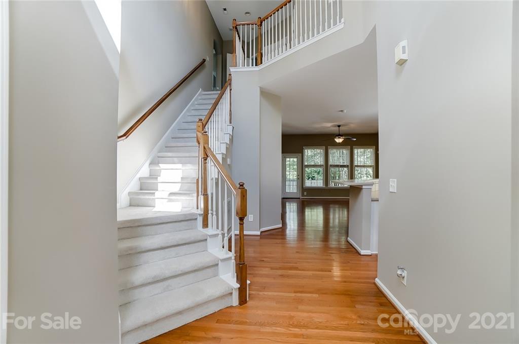 142 Blandina Court Fort Mill, SC 29708 - Photo 4 of 40 a view of entryway and hall with wooden floor