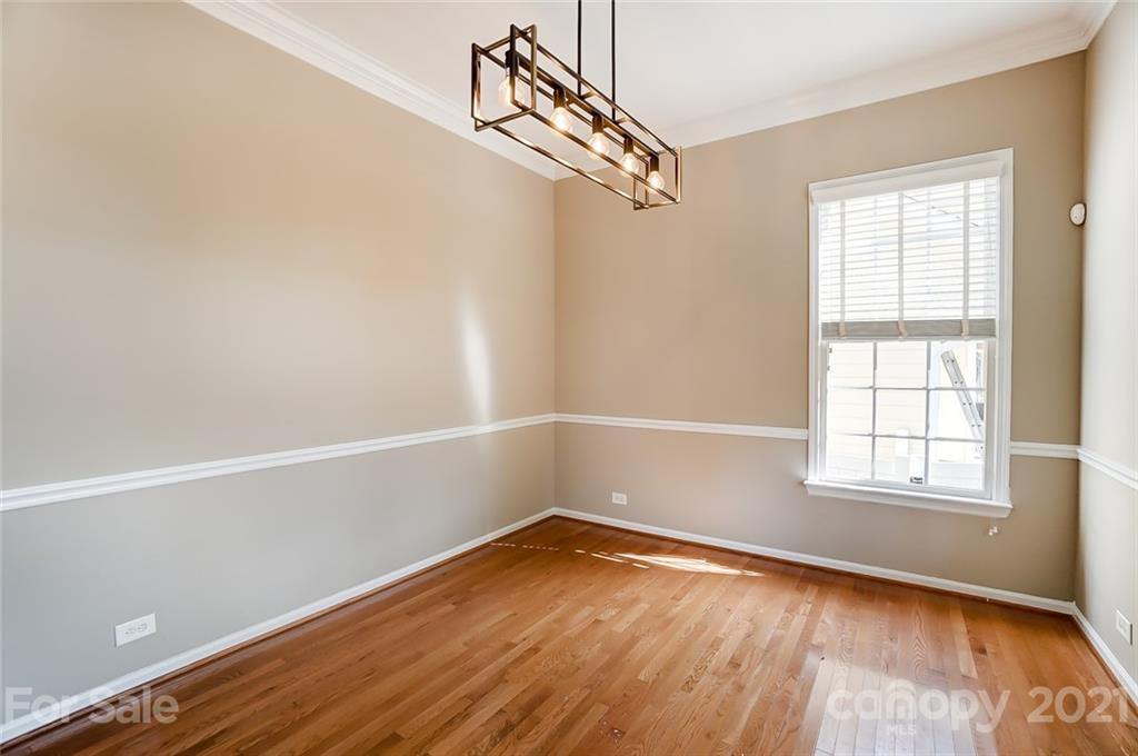 142 Blandina Court Fort Mill, SC 29708 - Photo 5 of 40 an empty room with wooden floor and windows