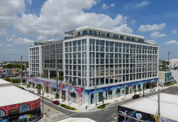 a front view of a building with street view