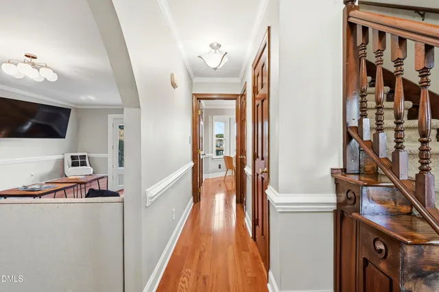 a living room with furniture fireplace and flat screen tv