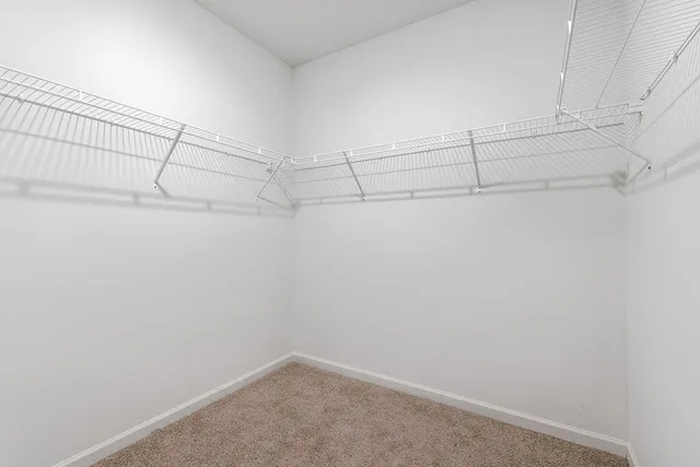 a view of a room with a table and chair