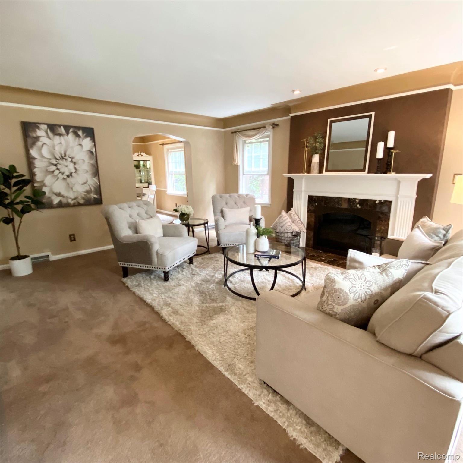 20424 Stratford Road Detroit, MI 48221 - Photo 4 of 19 Comfortable and welcoming living room open to the dining room and kitchen.