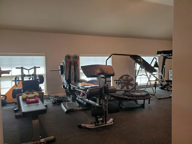 a view of a room with gym equipment