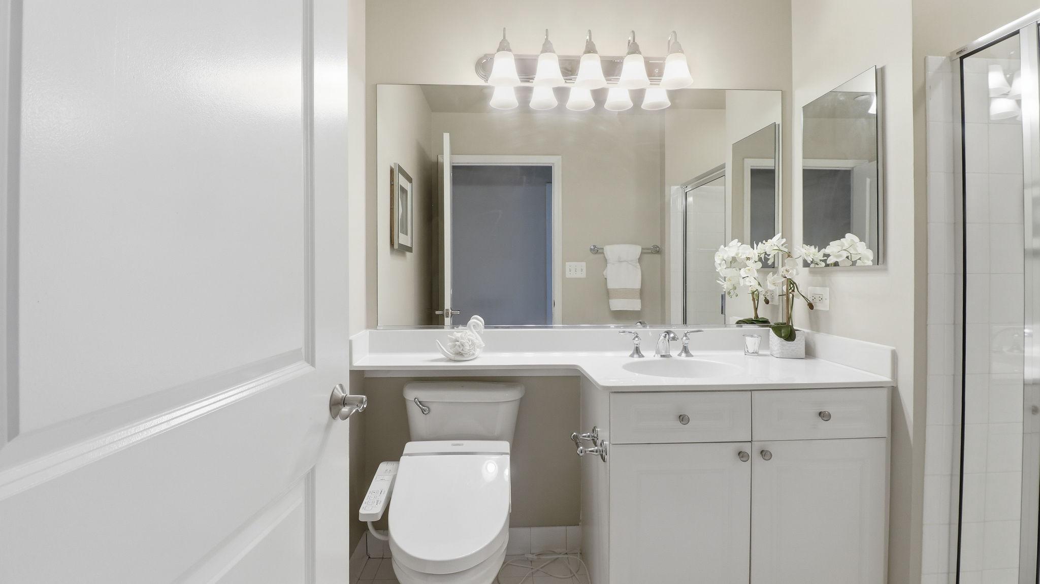 11700 Old Georgetown Road, Unit 1007 North Bethesda, MD 20852 - Photo 23 of 36 Modern elegance in a serene second full bathroom.