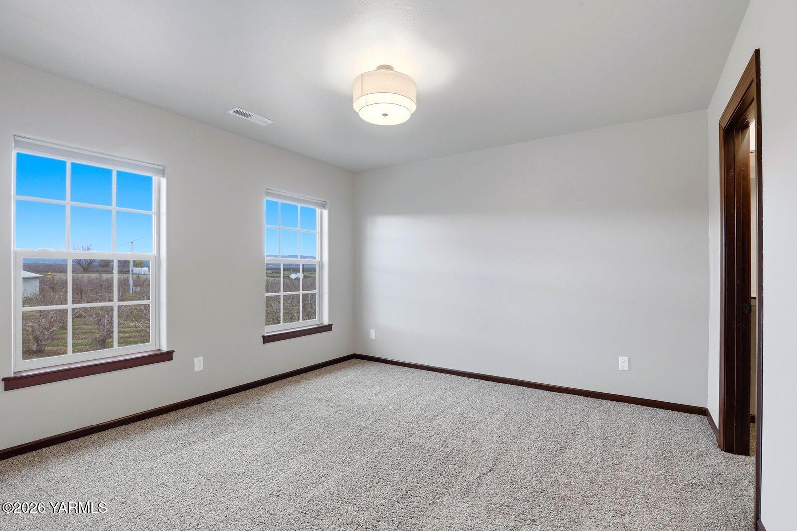 13507 West Church Road Yakima, WA 98903 - Photo 28 of 46 a view of an empty room with a window