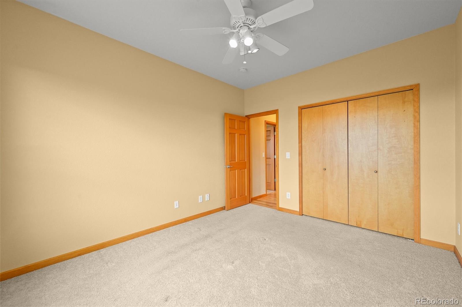 16231 Rayburn Street Hudson, CO 80642 - Photo 19 of 50 a view of an empty room with a window