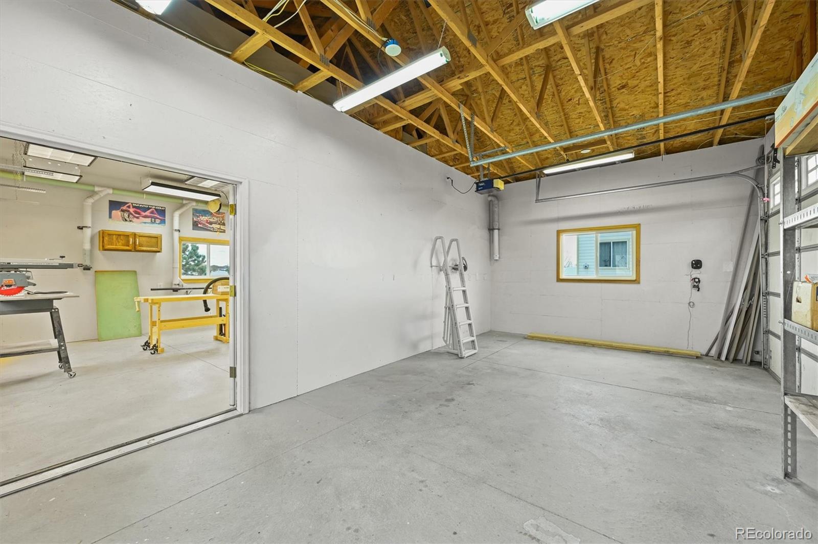 16231 Rayburn Street Hudson, CO 80642 - Photo 30 of 50 a view of a room with gym equipment