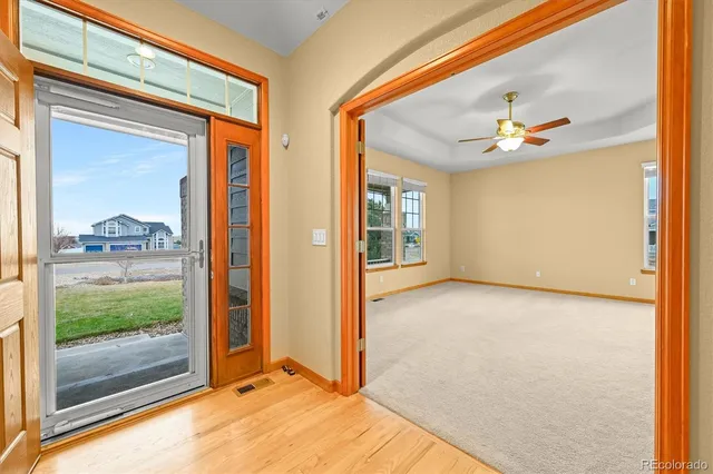 a view of an empty room and window