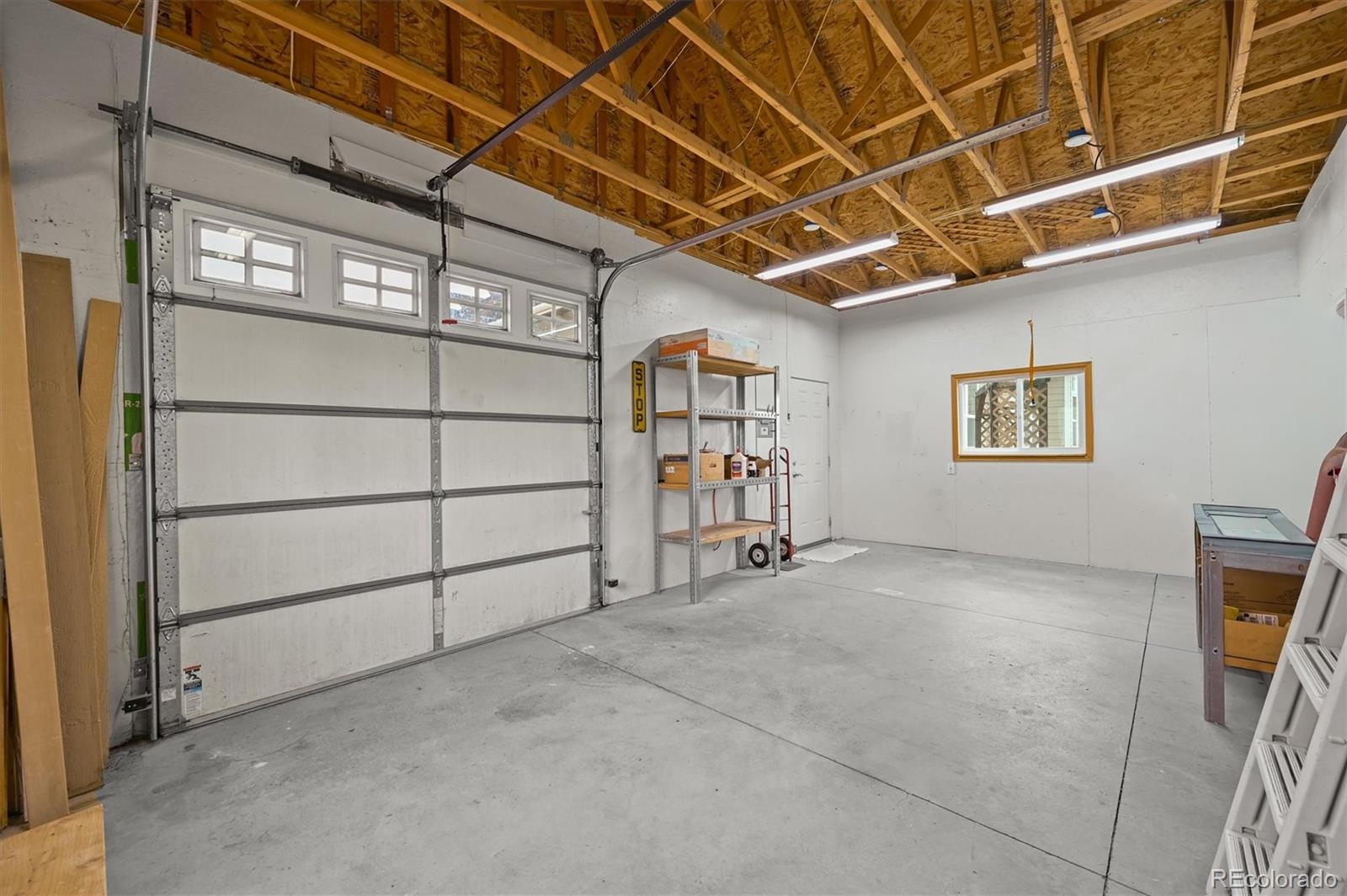 16231 Rayburn Street Hudson, CO 80642 - Photo 36 of 50 a view of a room with racks on the wall