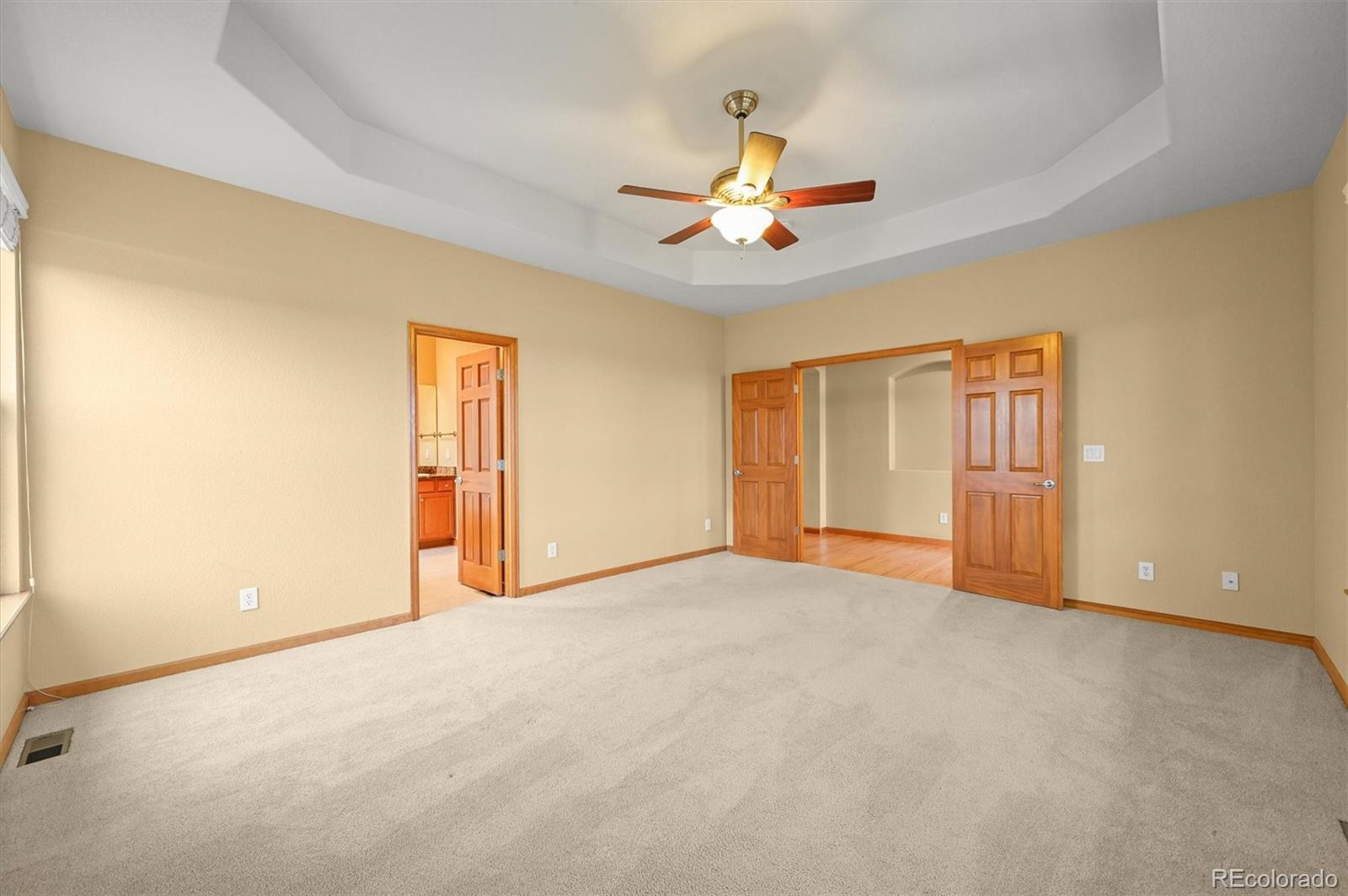 16231 Rayburn Street Hudson, CO 80642 - Photo 5 of 50 a view of an empty room with a window