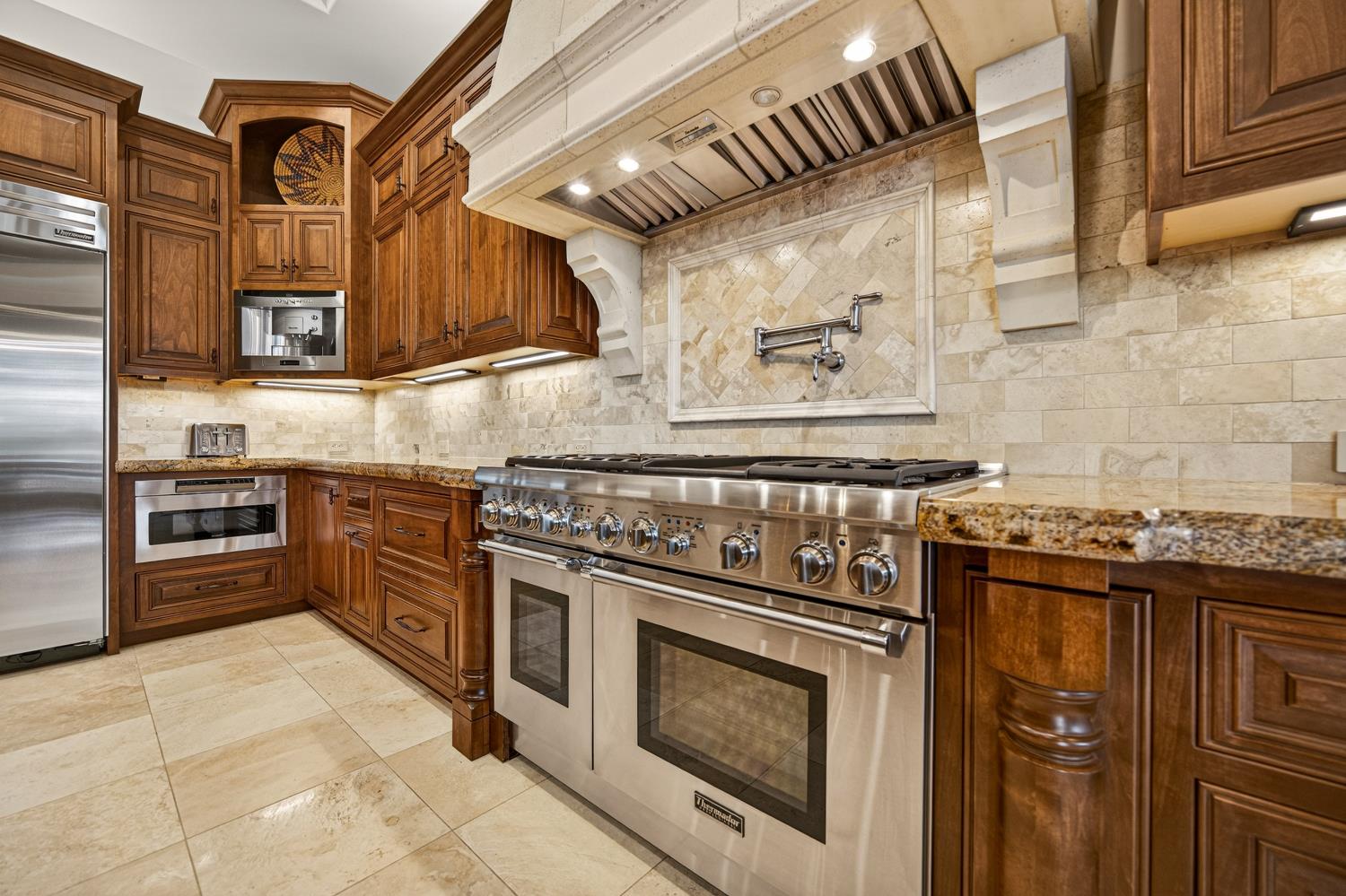 3909 Edgevale Court Fair Oaks, CA 95628 - Photo 30 of 98 a kitchen with stainless steel appliances granite countertop a stove and a sink